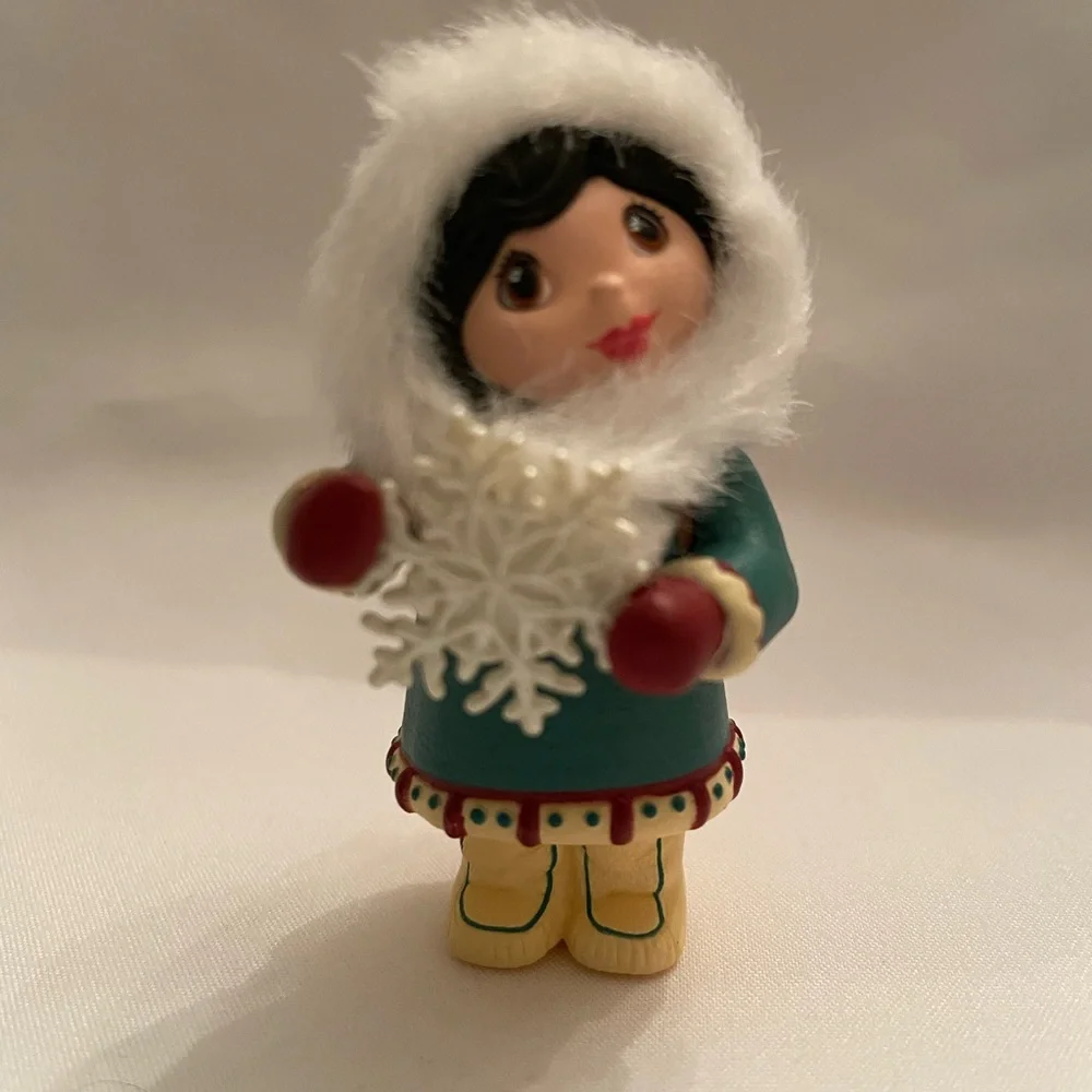 Hallmark Ornament - Girl in Teal and White with Red Accents. EUC in original box